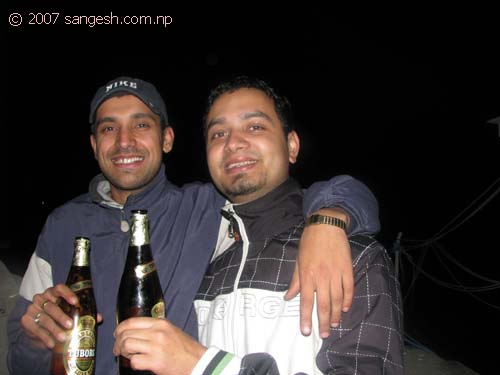 Posing in front of the camera with beer