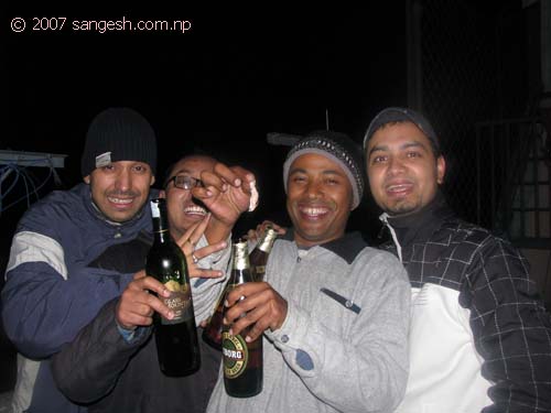 Beer and chicken BBQ - good combination; and great smile guys