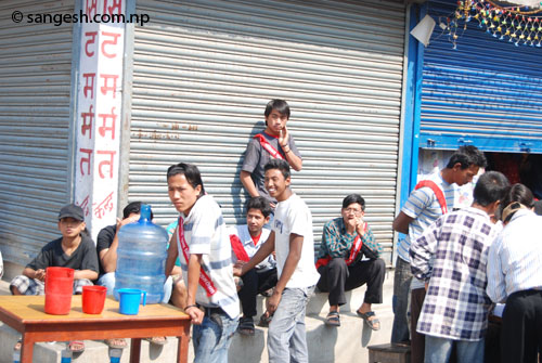 Volunteers offering water during Constituent Assembly election - Nepal